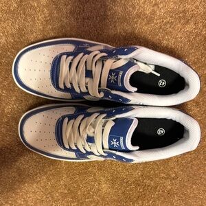 Blue and White Sneakers size 9 with Low-Top Design and Lace-Up Closure Size 9/42